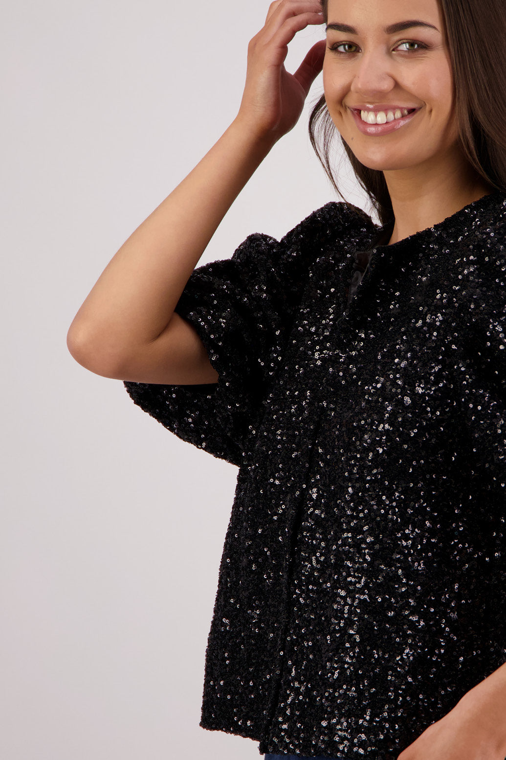 Closeup side view Briarwood Treasure Top in Black Sequins.