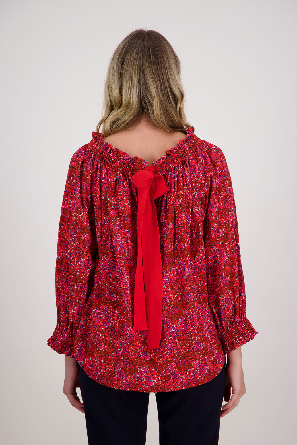 Red Floral Briarwood Reversible viscose top. 3/4 Sleeves and complementary tie worn at the front or back. Annabelle