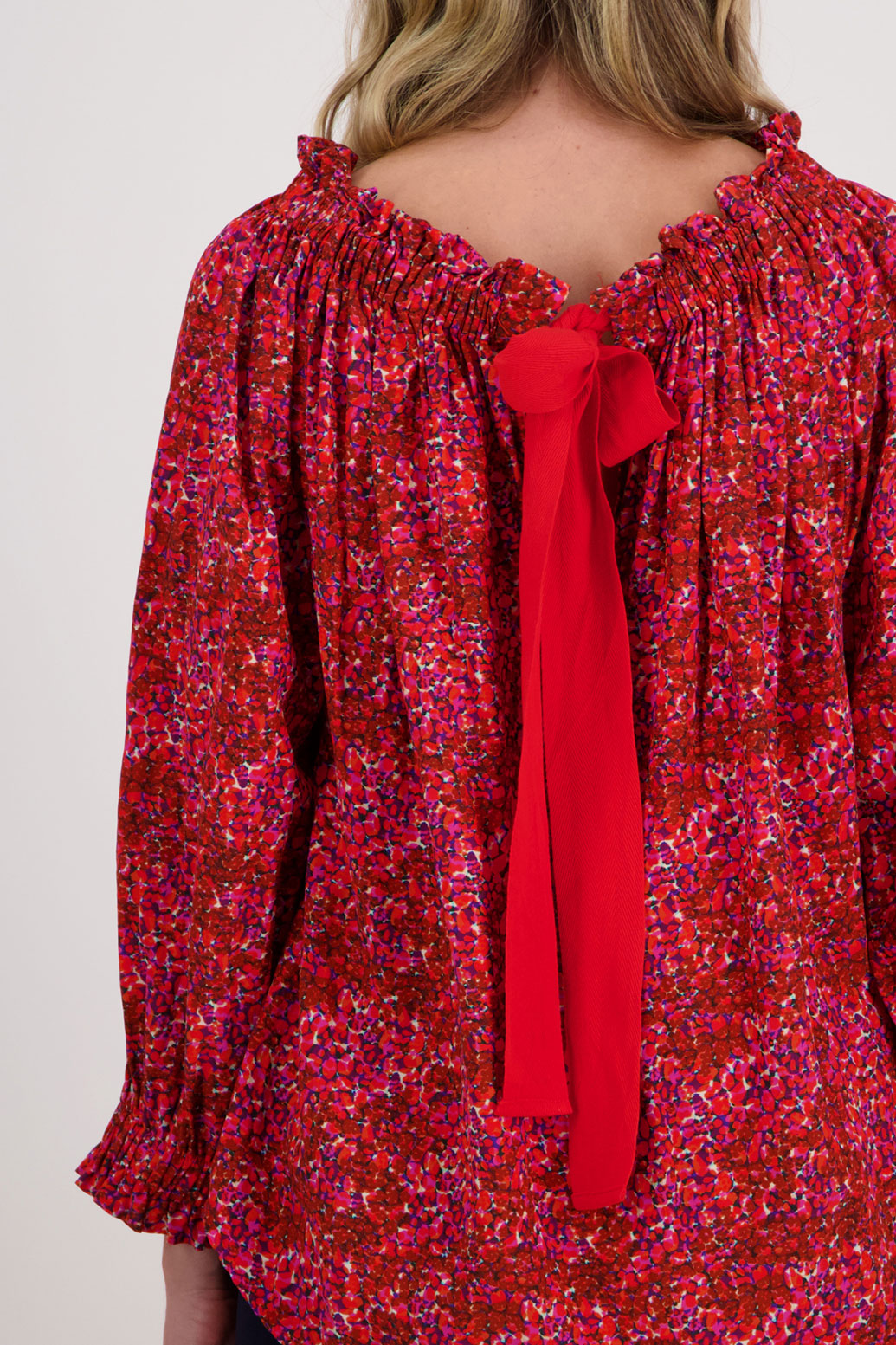 Red Floral Briarwood Reversible viscose top. 3/4 Sleeves and complementary tie worn at the front or back. Annabelle