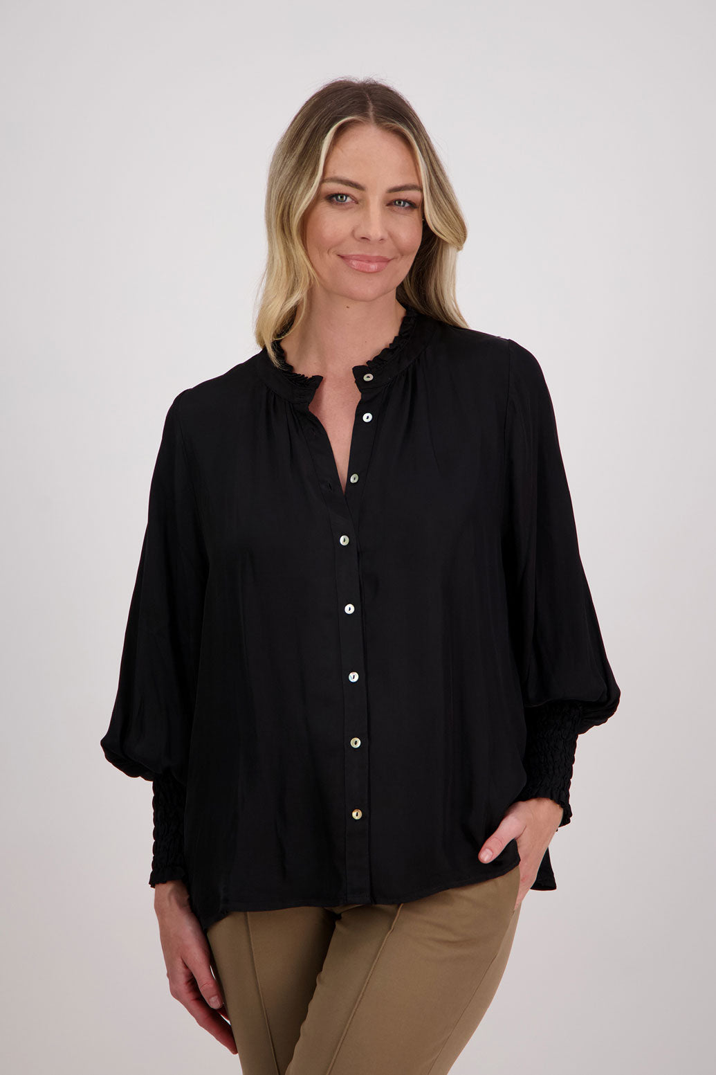 Black Viscose long sleeve shirt with ruffle collar and shirred sleeves with ruffle. Audrey