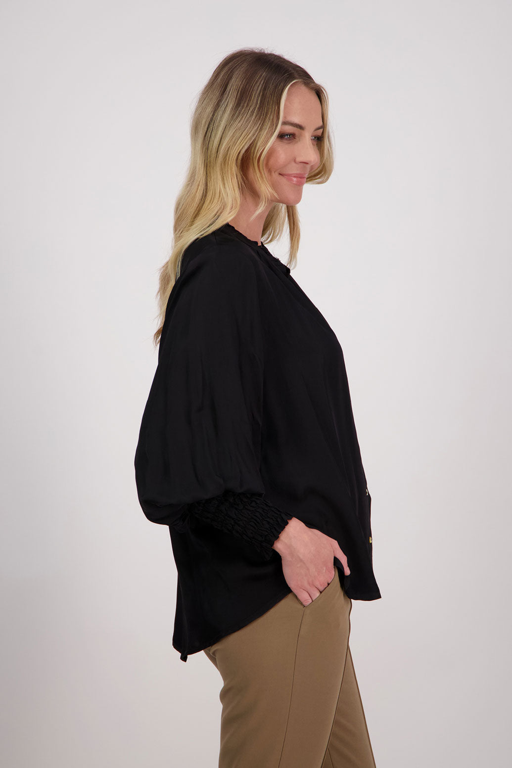 Black Viscose long sleeve shirt with ruffle collar and shirred sleeves with ruffle. Audrey