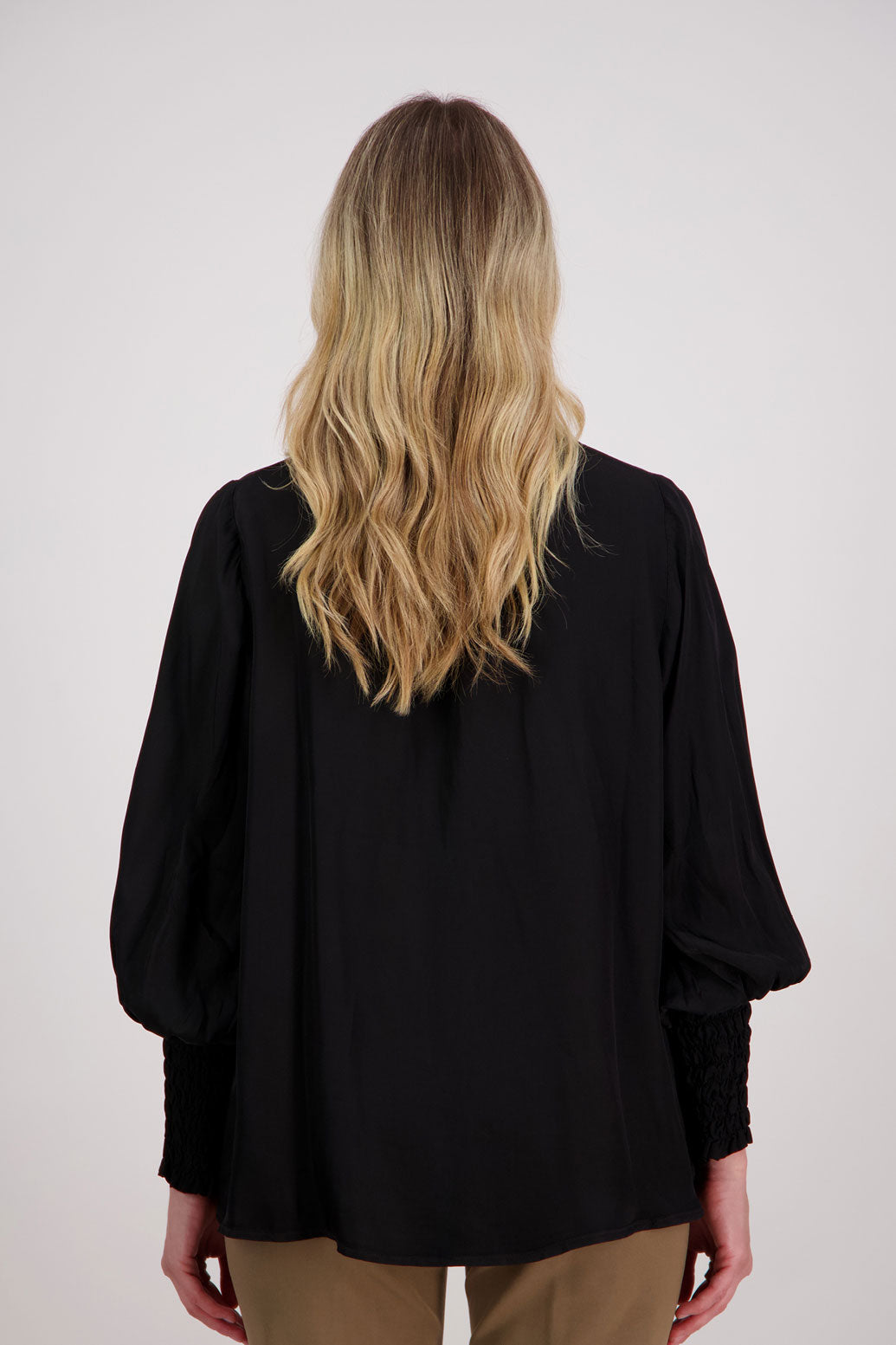 Black Viscose long sleeve shirt with ruffle collar and shirred sleeves with ruffle. Audrey