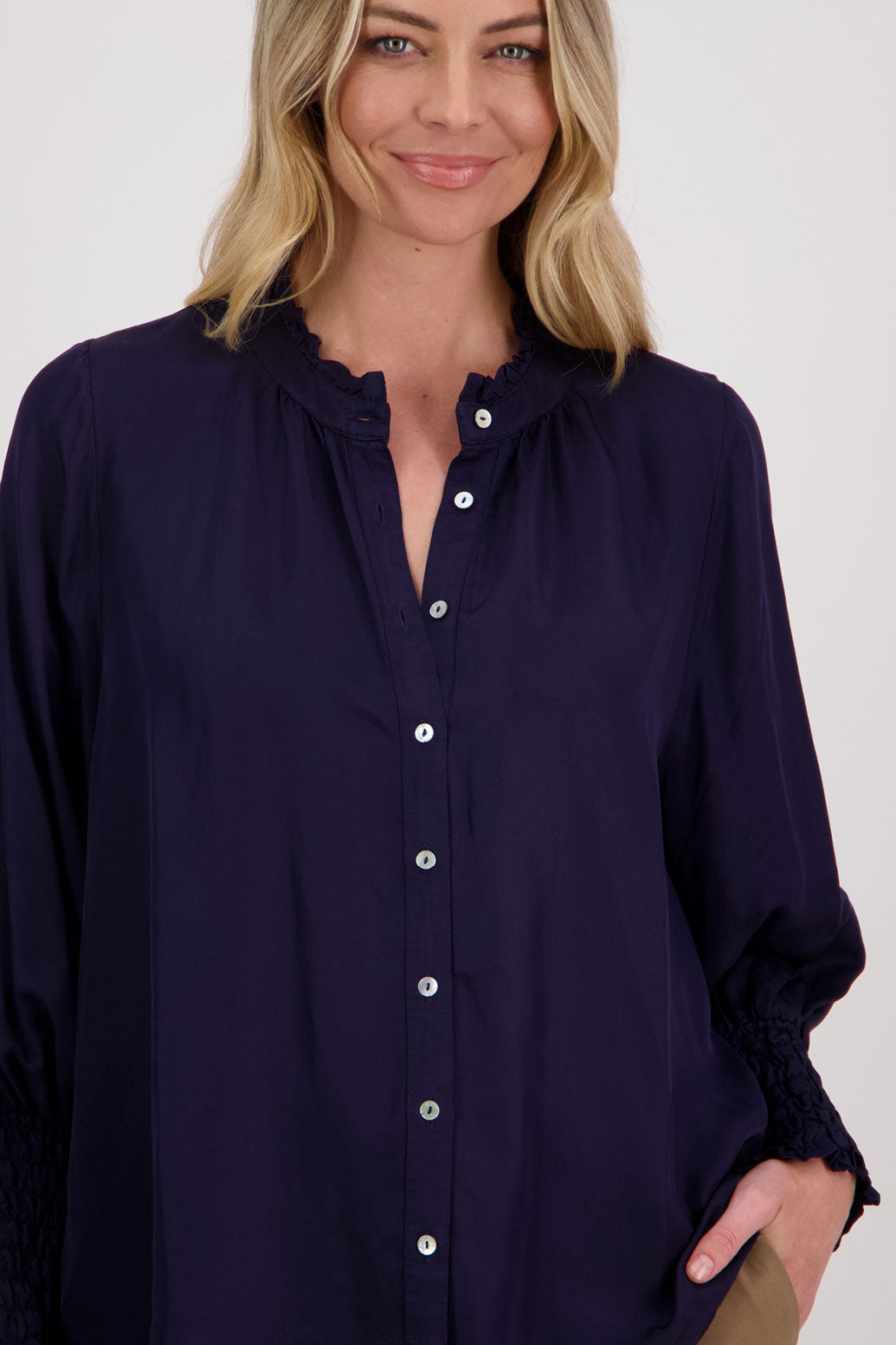 Ink Viscose long sleeve shirt with ruffle collar and shirred sleeves with ruffle. Audrey