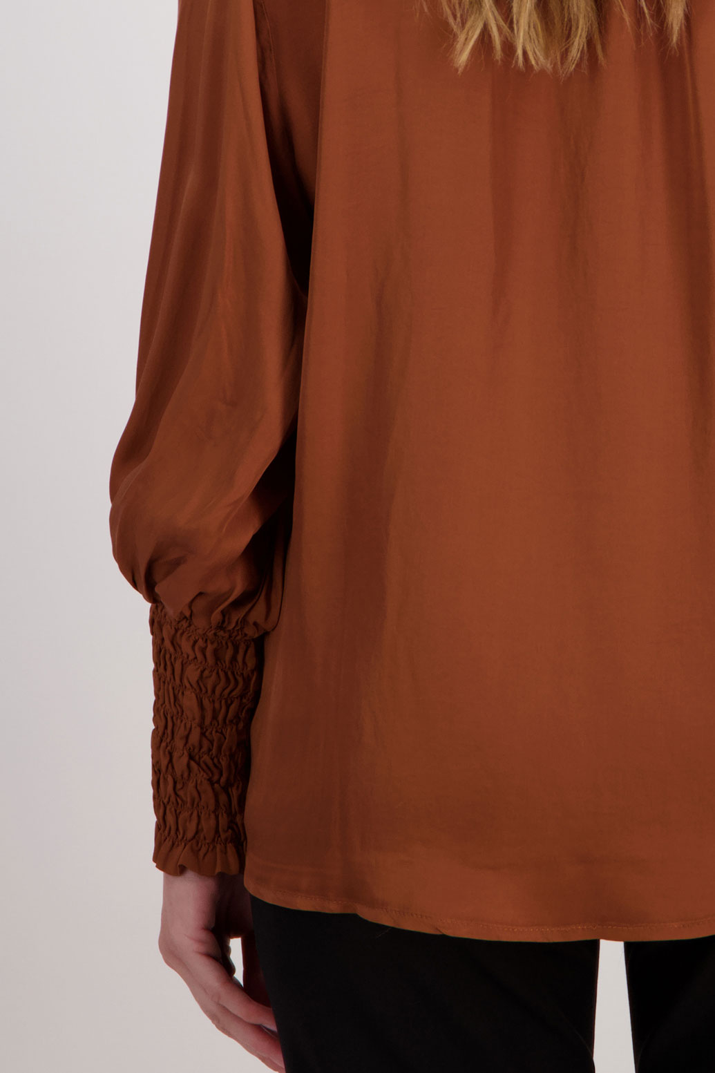 Tan Viscose long sleeve shirt with ruffle collar and shirred sleeves with ruffle. Audrey