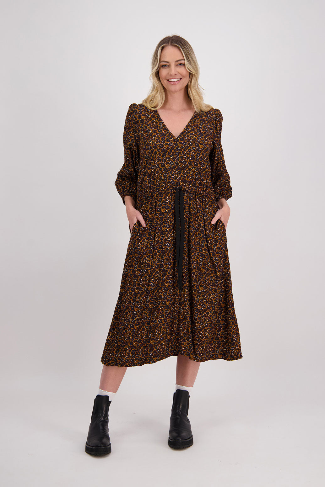 Brown Animal Briarwood visose N neck midi dress. Drawstring around the waist to create the perfect fit. Slight puff on gathered shoulders. Cara