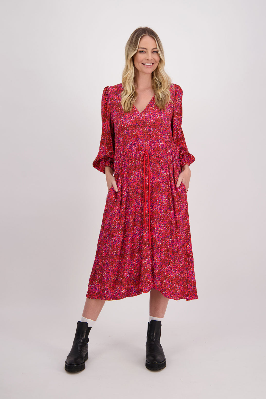 Red Floral Briarwood visose N neck midi dress. Drawstring around the waist to create the perfect fit. Slight puff on gathered shoulders. Cara