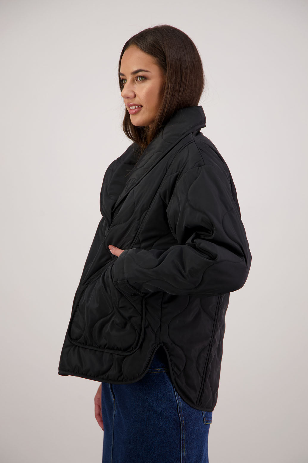 BESTSELLER. Chapman Quilted Jacket in Black by Briarwood NZ. High collar, side split detail, buttons front, stitched on pockets, slightly longer in the back, box fit, lined