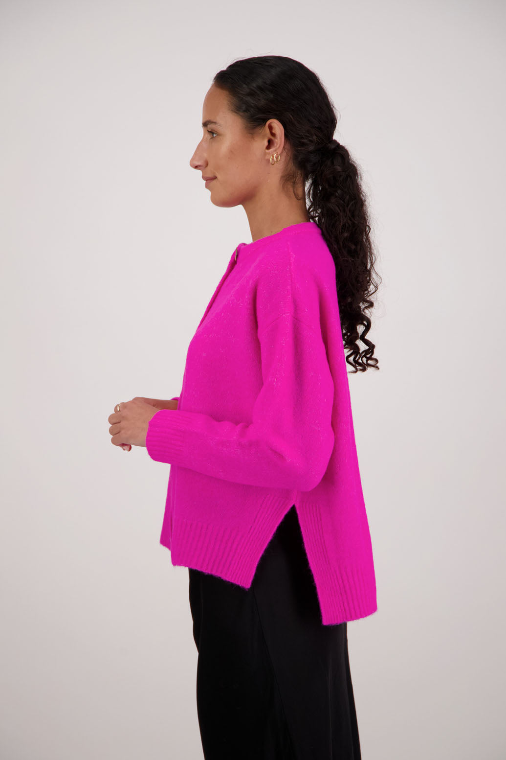 Fable Cardigan in Pink by Briarwood NZ. Alpaca/Wool blend long sleeve cardigan with side splits and longer at the back