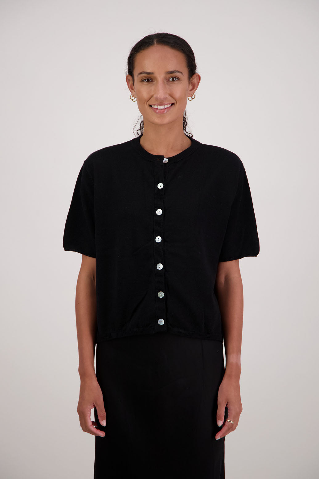 Felix Wool Cardigan in Black by Briarwood NZ. 100% Wool cardigan with short sleeves, buttoned front, box fit