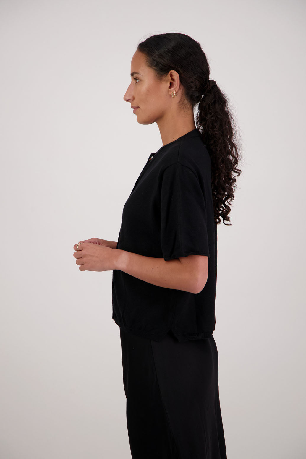 Felix Wool Cardigan in Black by Briarwood NZ. 100% Wool cardigan with short sleeves, buttoned front, box fit