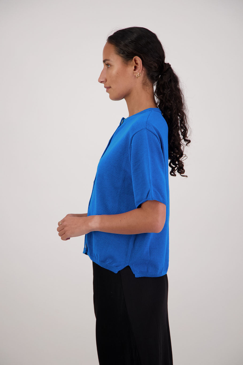 Felix Wool Cardigan in Turquoise by Briarwood NZ. 100% Wool cardigan with short sleeves, buttoned front, box fit