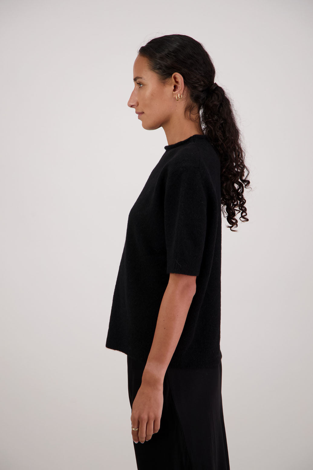 Fleur Top in Black by Briarwood NZ. Alpaca/Wool blend top with high neck, short sleeve t-shirt style, semi-fitted