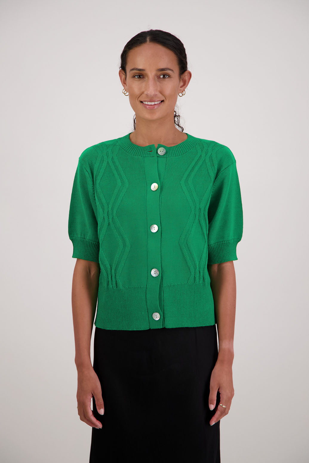 French Wool Cardigan in Emerald by Briarwood NZ. 100% Wool cardigan with short sleeves, buttoned front, wide waist band and self pattern on front