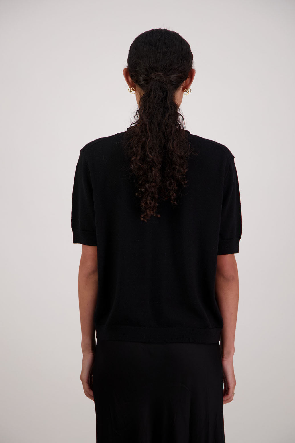 Frieda Wool Top in Black by Briarwood NZ. 100% Wool short sleeve, semi fitted t-shirt style top with high neck