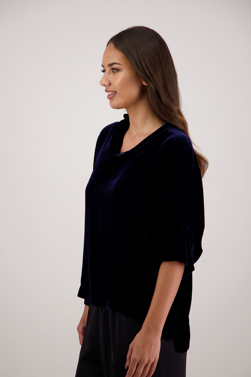 Bestseller. Hanley Top in Ink Velvet by Briarwood NZ. A  18% Silk, 82% Rayon Velvet Top with roll neck, 3/4 sleeves, split hem, loose fit, longer at the back