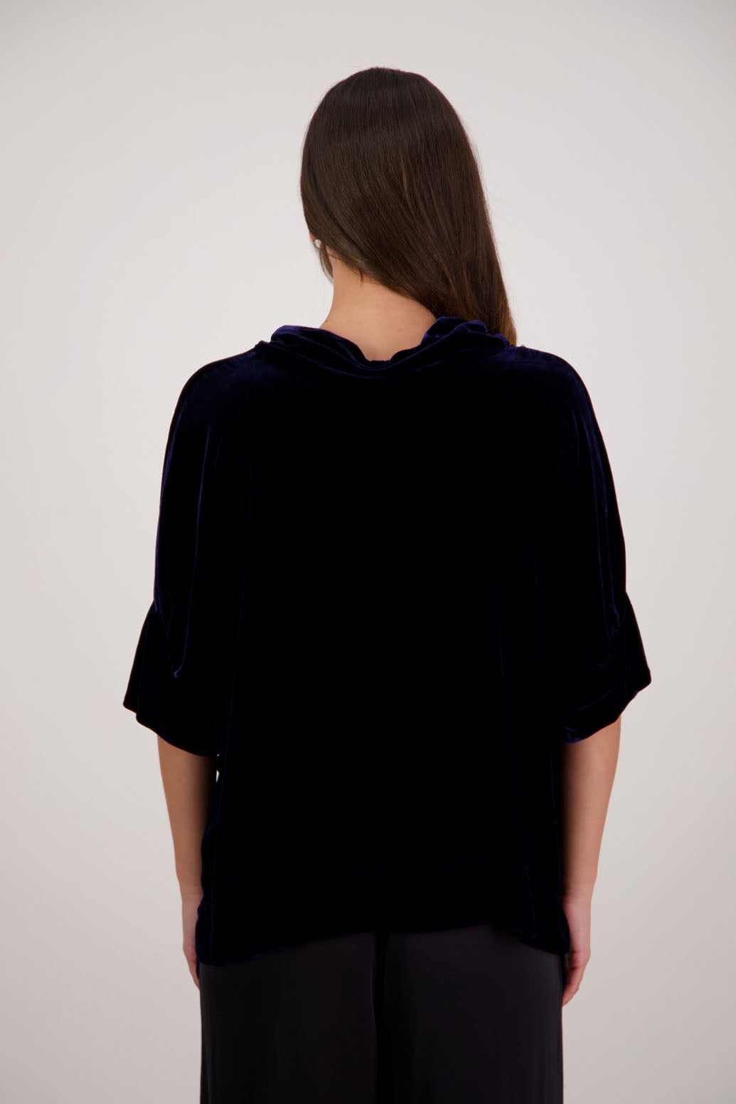 Bestseller. Hanley Top in Ink Velvet by Briarwood NZ. A  18% Silk, 82% Rayon Velvet Top with roll neck, 3/4 sleeves, split hem, loose fit, longer at the back