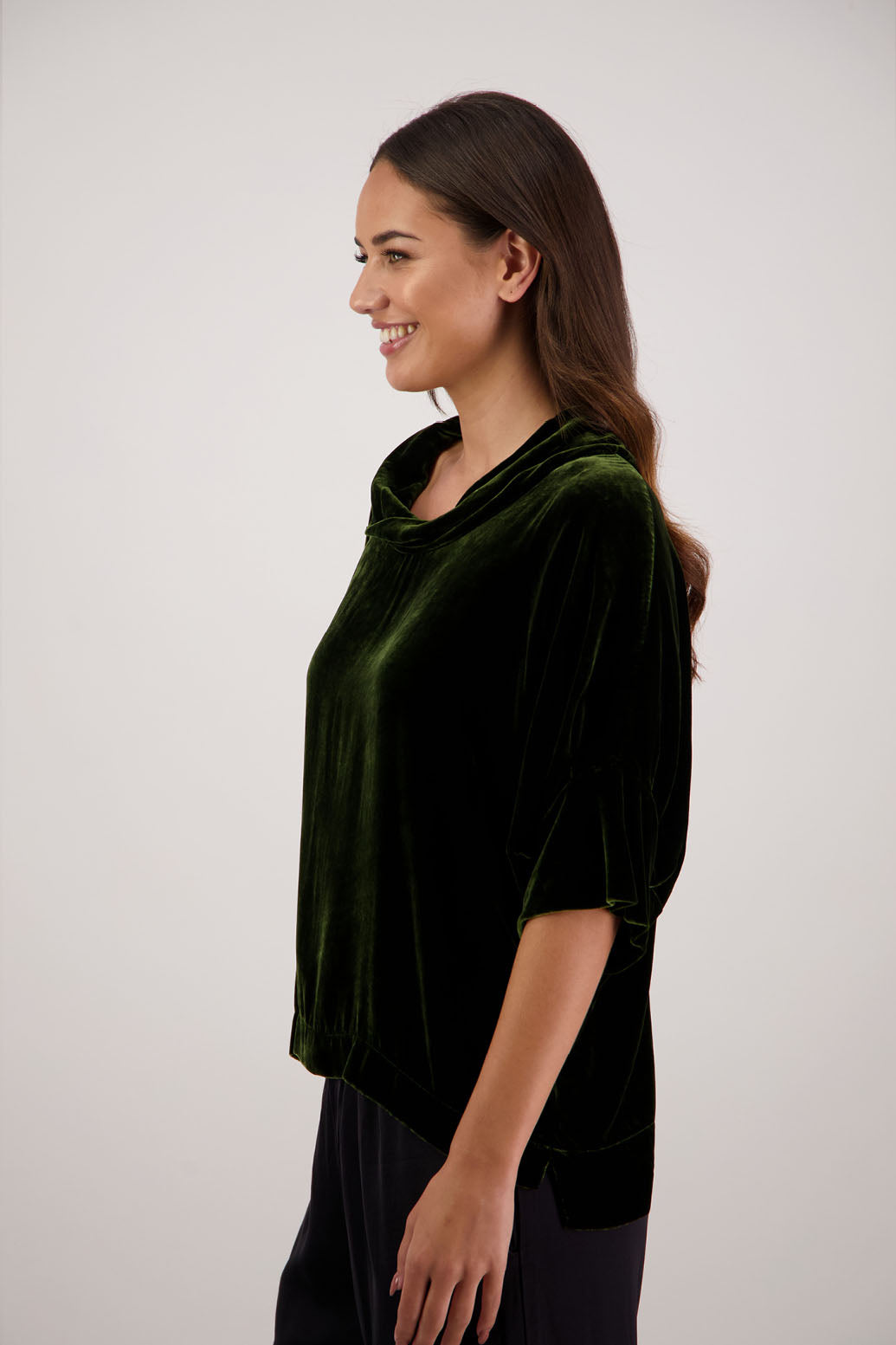 Bestseller. Hanley Top in Khaki Velvet by Briarwood NZ. A  18% Silk, 82% Rayon Velvet Top with roll neck, 3/4 sleeves, split hem, loose fit, longer at the back