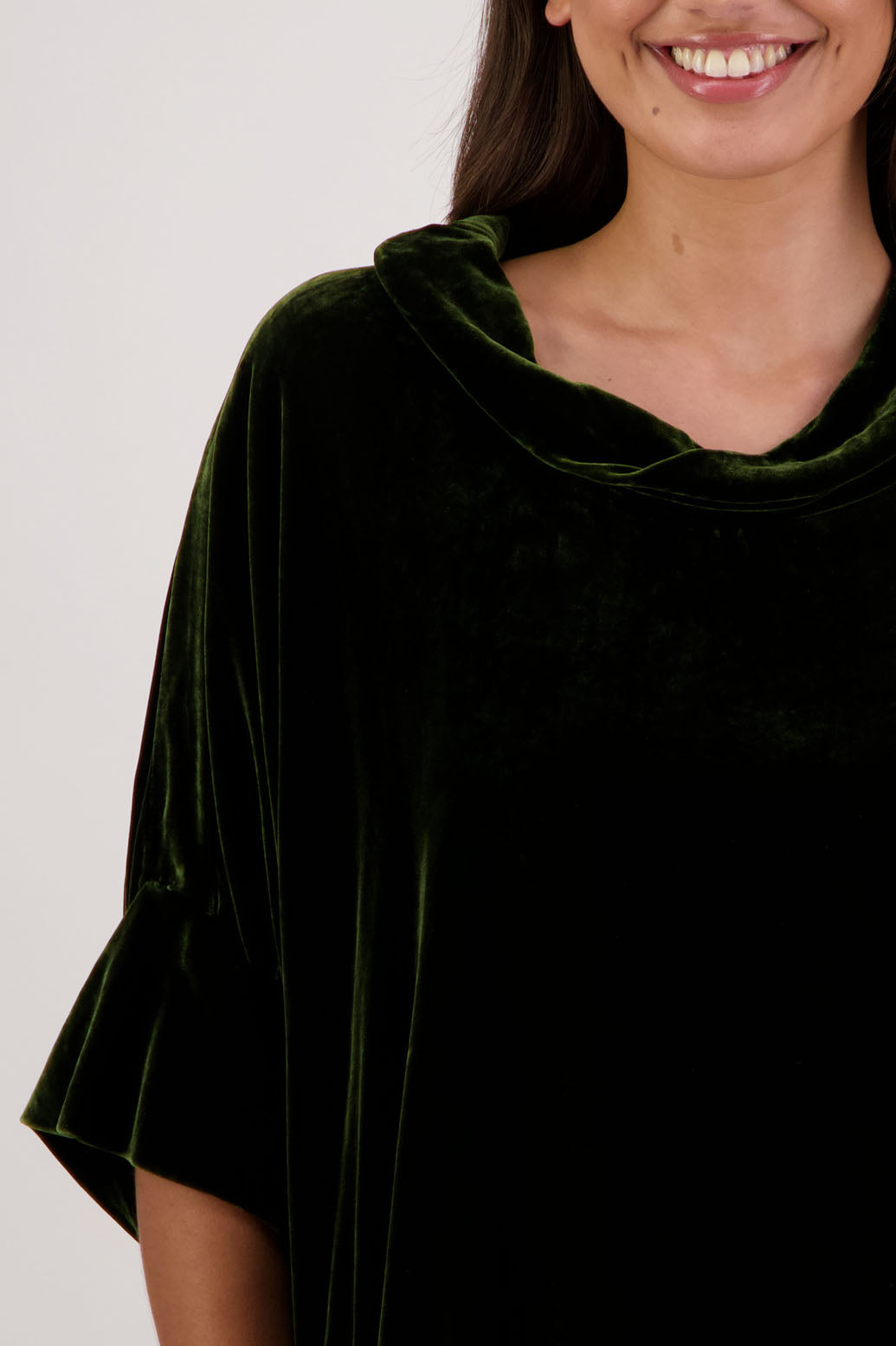 Bestseller. Hanley Top in Khaki Velvet by Briarwood NZ. A  18% Silk, 82% Rayon Velvet Top with roll neck, 3/4 sleeves, split hem, loose fit, longer at the back