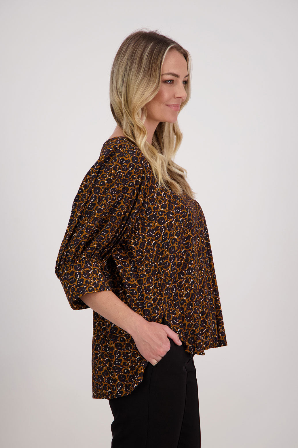 Brown Animal Briarwood viscose top with 3/4 sleeves, wide cuff and gathered back. Harrison