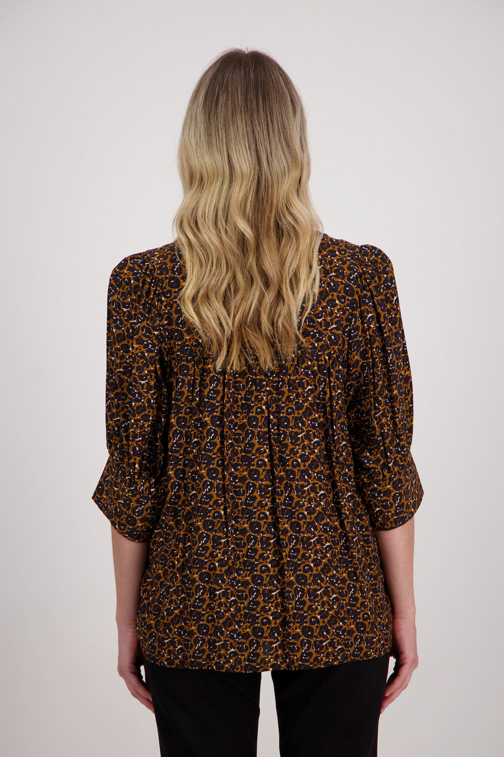 Brown Animal Briarwood viscose top with 3/4 sleeves, wide cuff and gathered back. Harrison