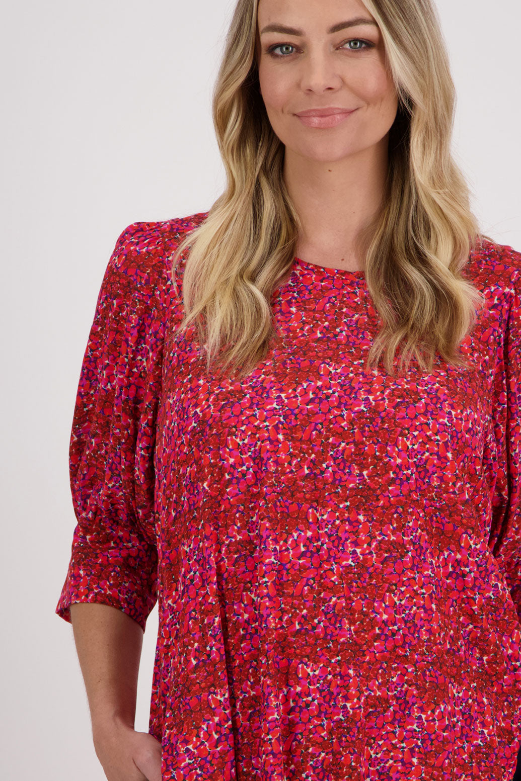 Red Floral Briarwood viscose top with 3/4 sleeves, wide cuff and gathered back. Harrison