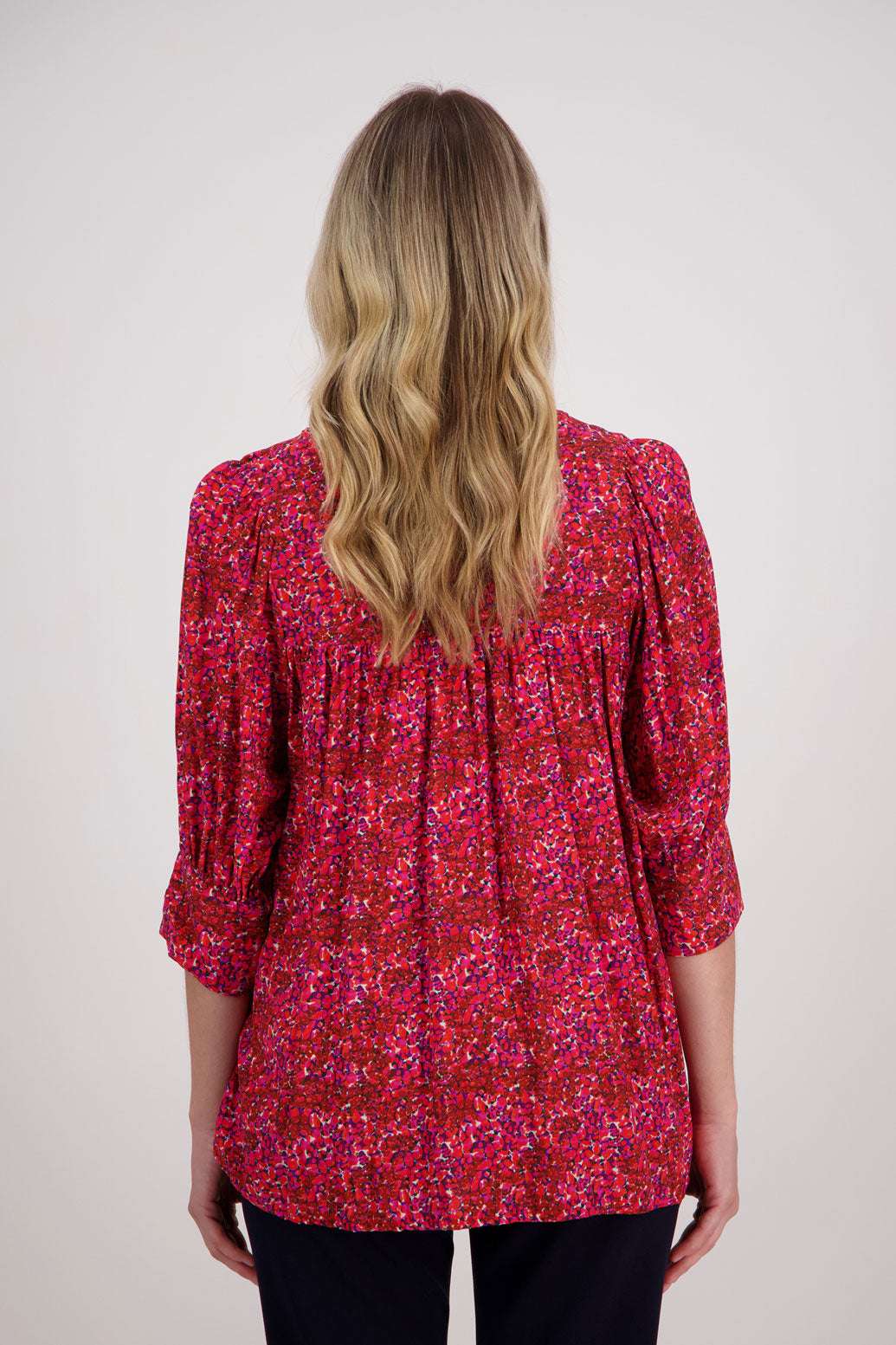 Red Floral Briarwood viscose top with 3/4 sleeves, wide cuff and gathered back. Harrison