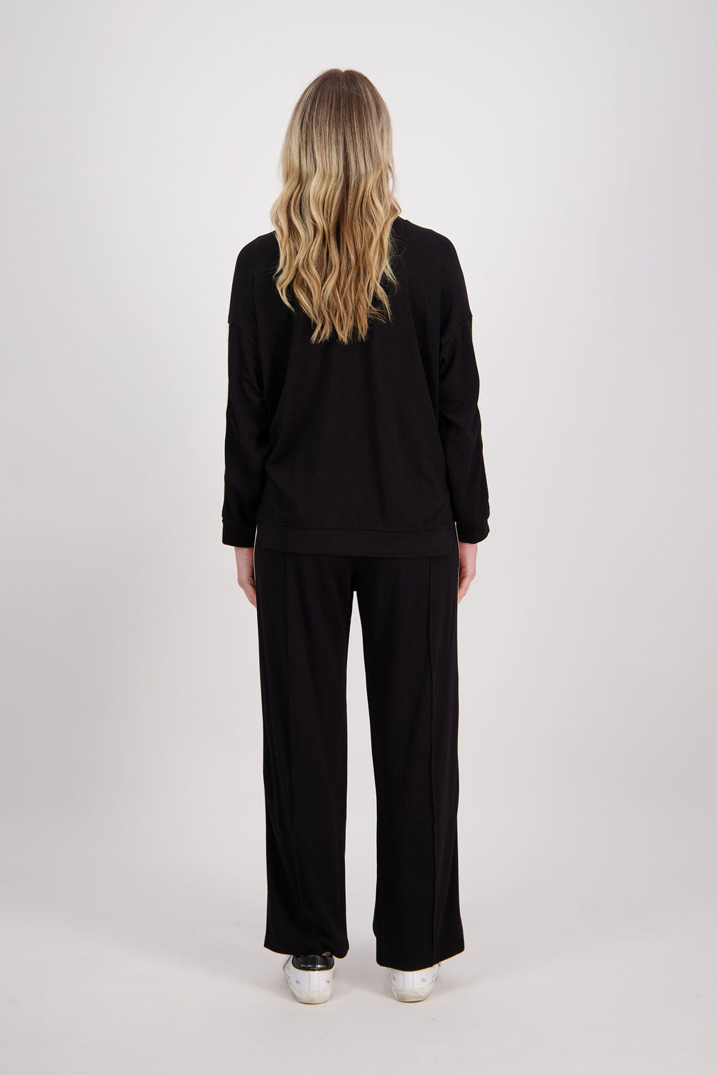 Black wide leg Ponte Pant with White/Ivory Side Stripe down the side of leg. Hector