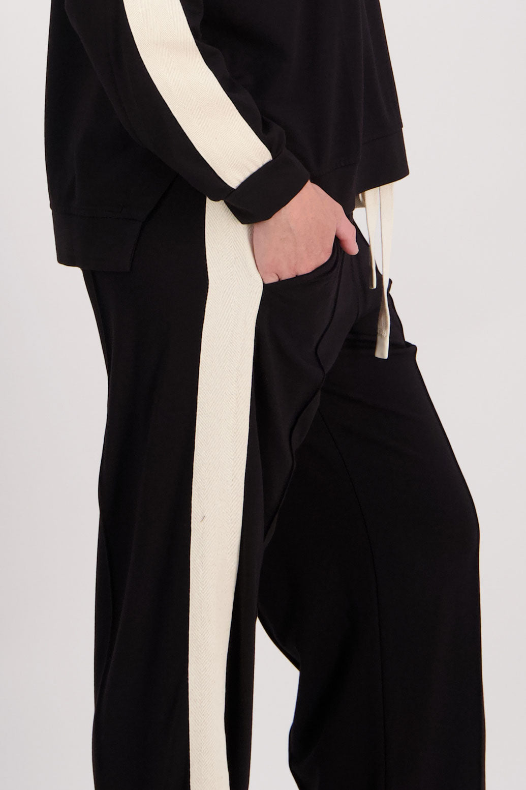 Black wide leg Ponte Pant with White/Ivory Side Stripe down the side of leg. Hector