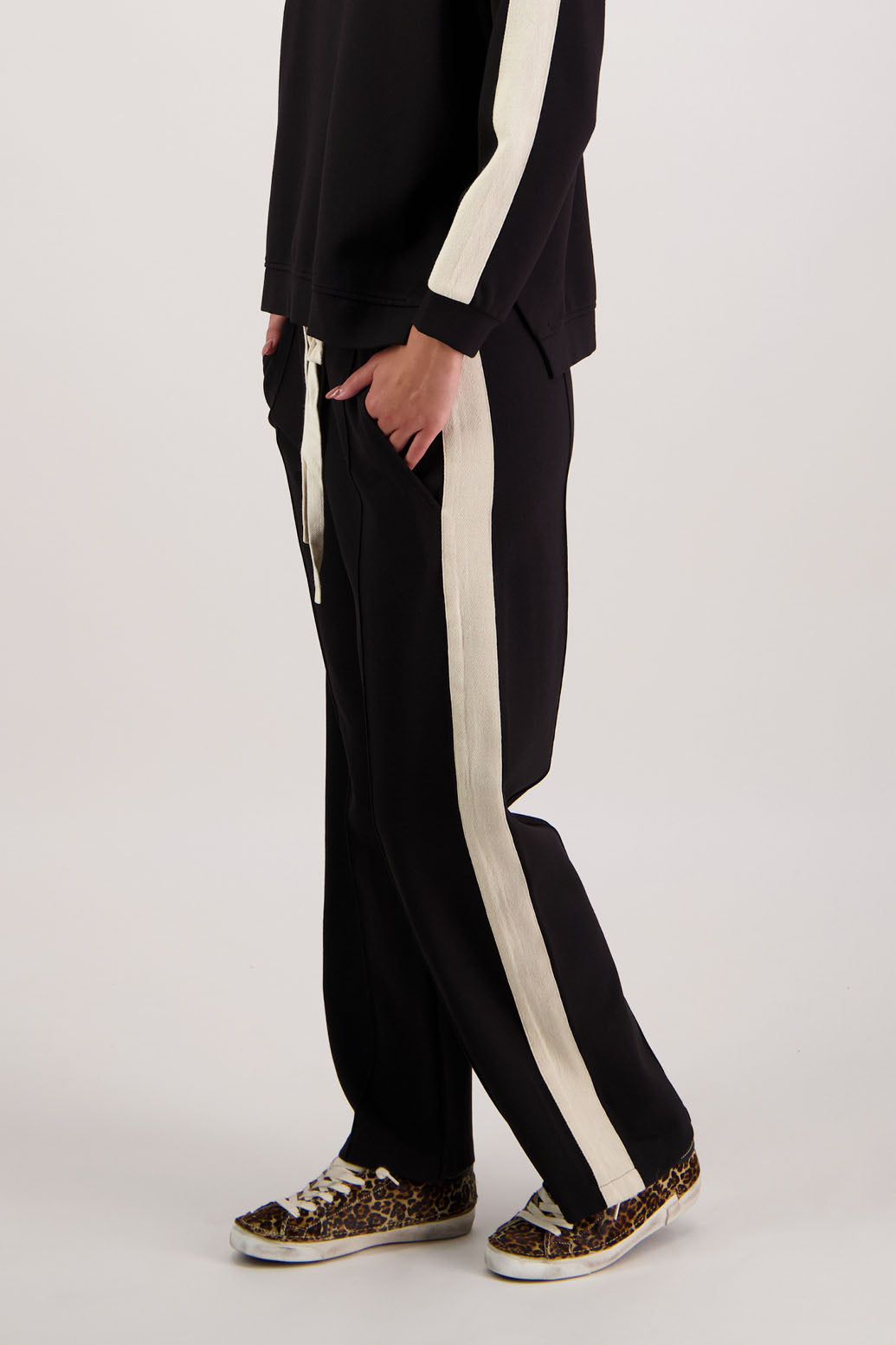 BESTSELLER. Hector pant in Black by Briarwood NZ. Ponte pant with elasticated waist with draw cord, pin tuck front & back, pockets and contrast side stripe