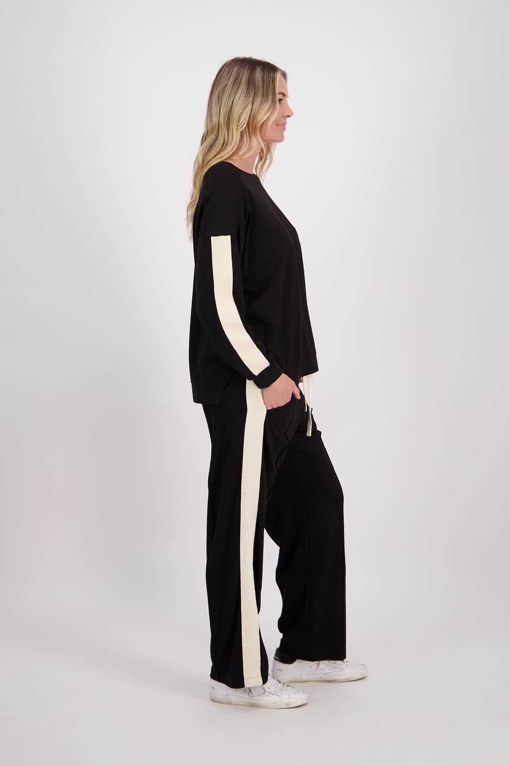 Black wide leg Ponte Pant with White/Ivory Side Stripe down the side of leg. Hector