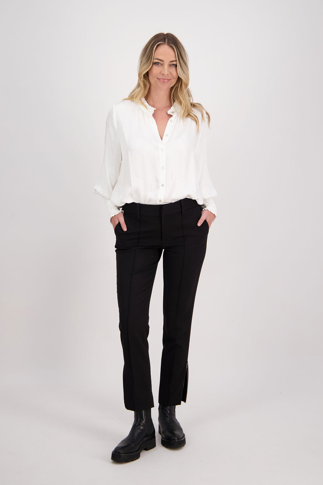 Black tailored pant with side splits and zips. Front pin stitch detail. Helena