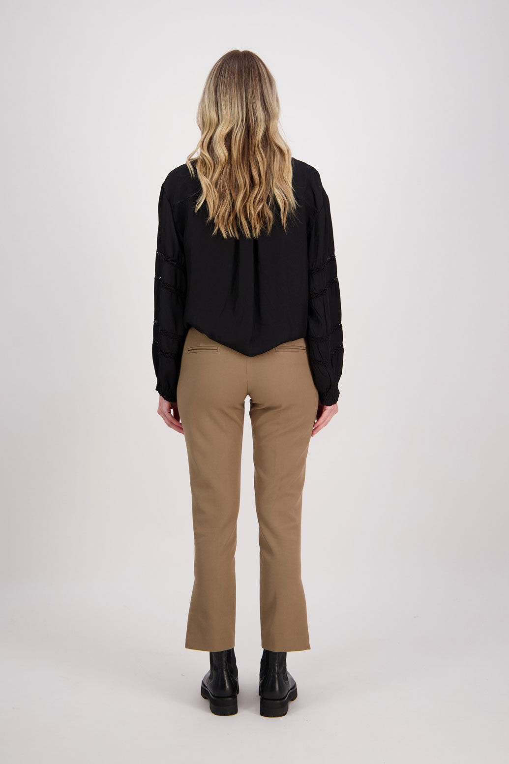 Camel tailored pant with side splits and zips. Front pin stitch detail. Helena