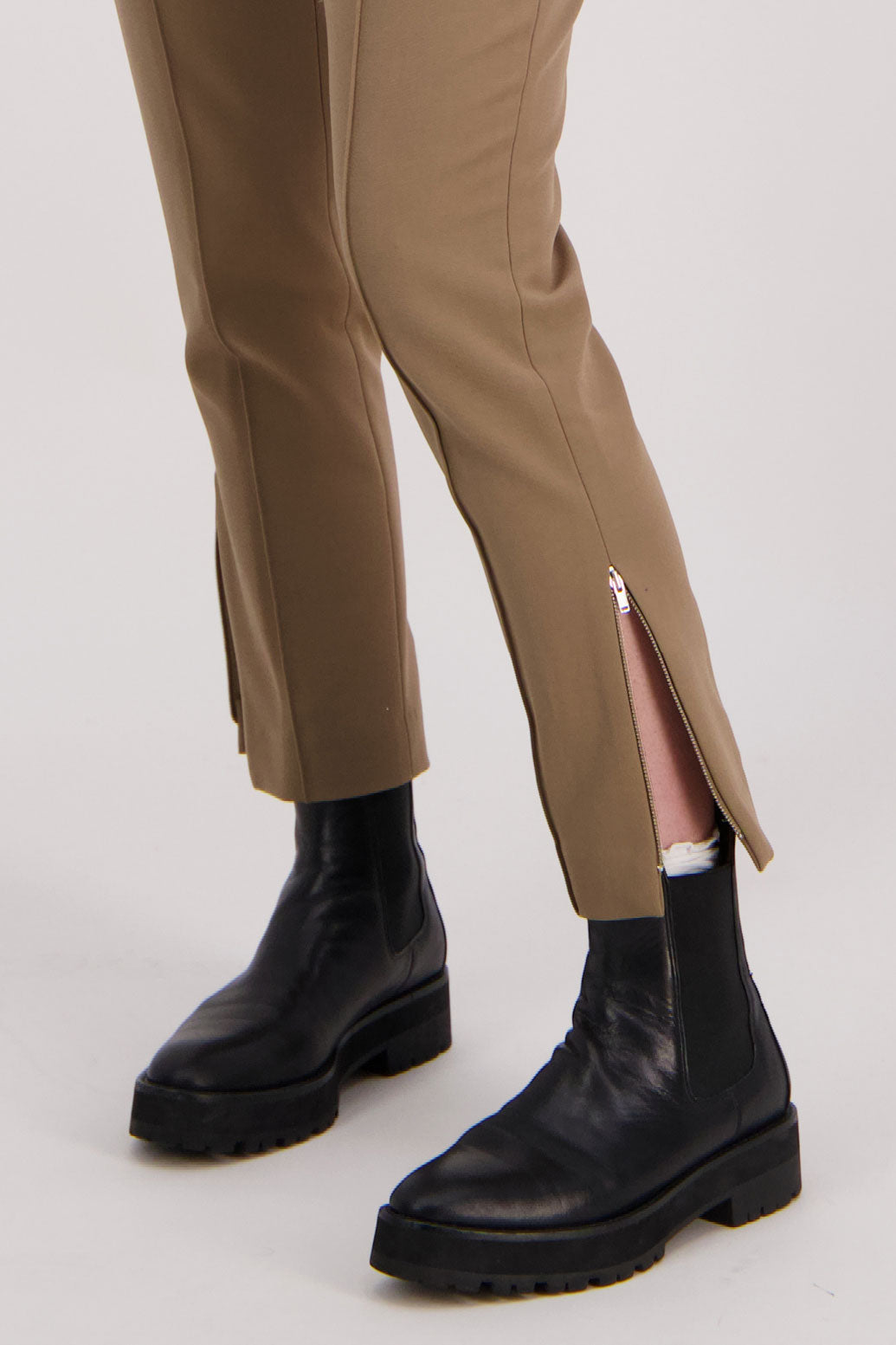 Camel tailored pant with side splits and zips. Front pin stitch detail. Helena