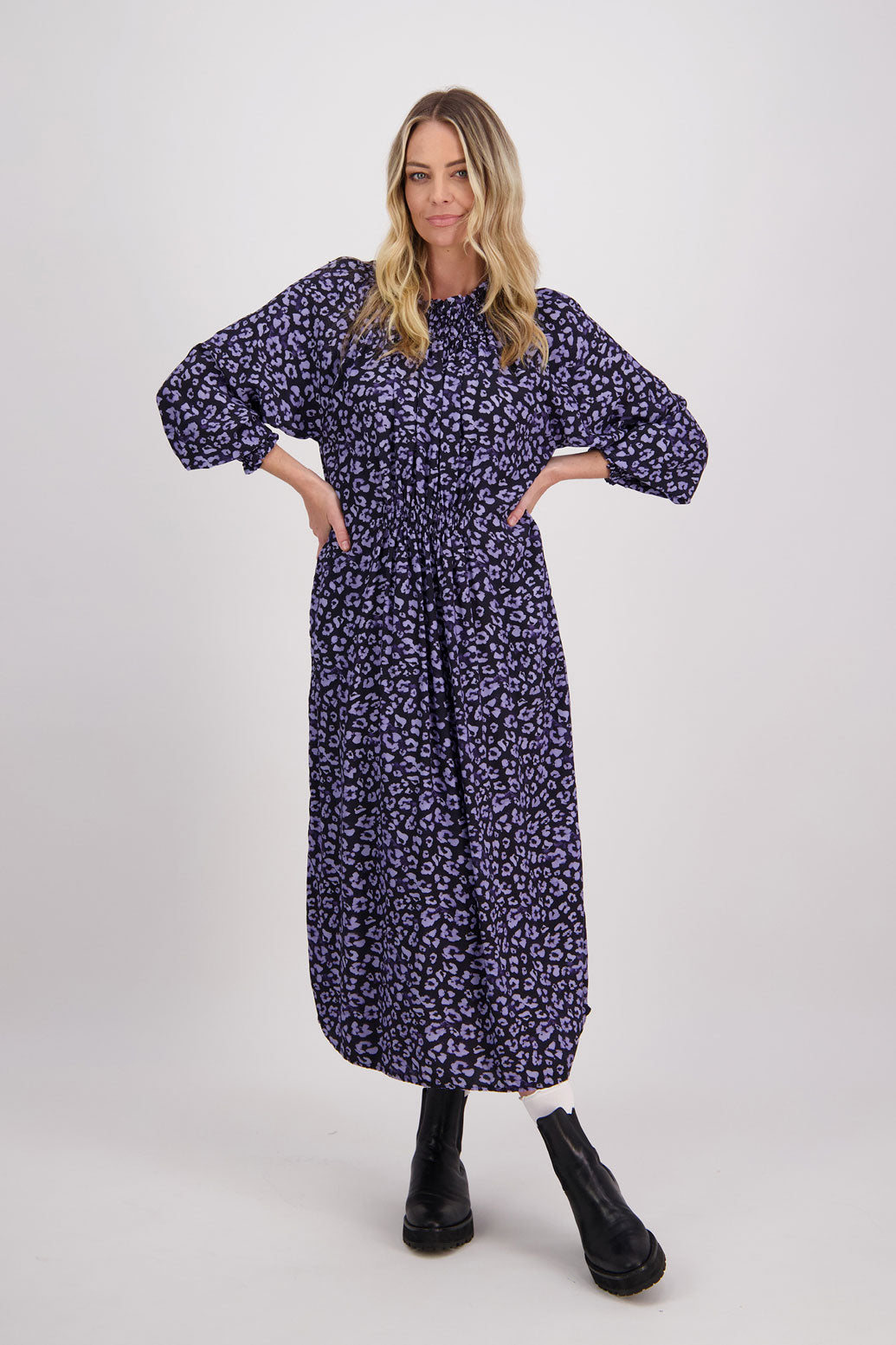 Blue Animal Briarwood viscose full length dress with shirt hem detail. Shirred detail around the neck, waist and sleeves. Shirred waistline detail at front and back gives gentle shape. Henna