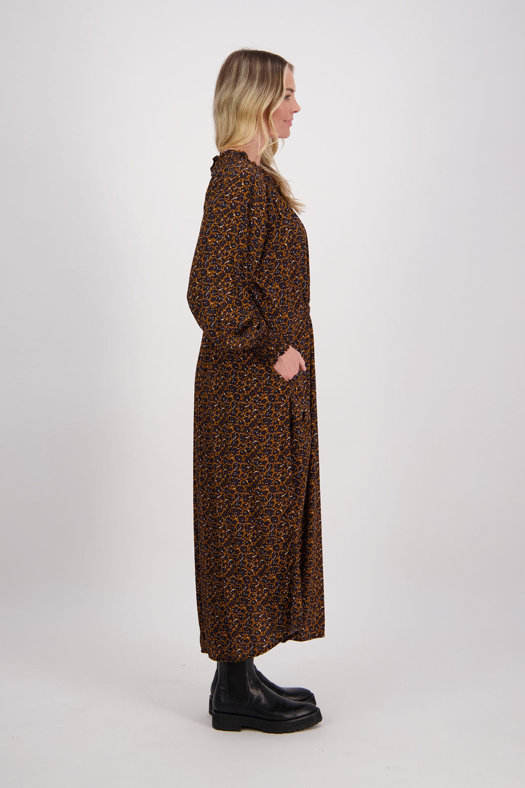 Brown Animal Briarwood viscose full length dress with shirt hem detail. Shirred detail around the neck, waist and sleeves. Shirred waistline detail at front and back gives gentle shape. Henna