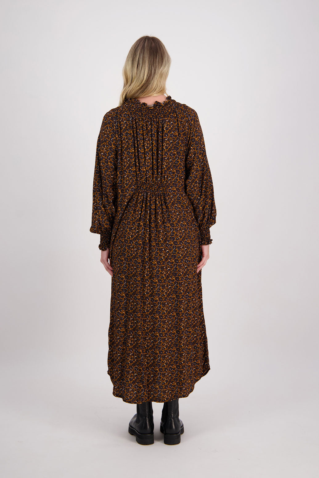 Brown Animal Briarwood viscose full length dress with shirt hem detail. Shirred detail around the neck, waist and sleeves. Shirred waistline detail at front and back gives gentle shape. Henna