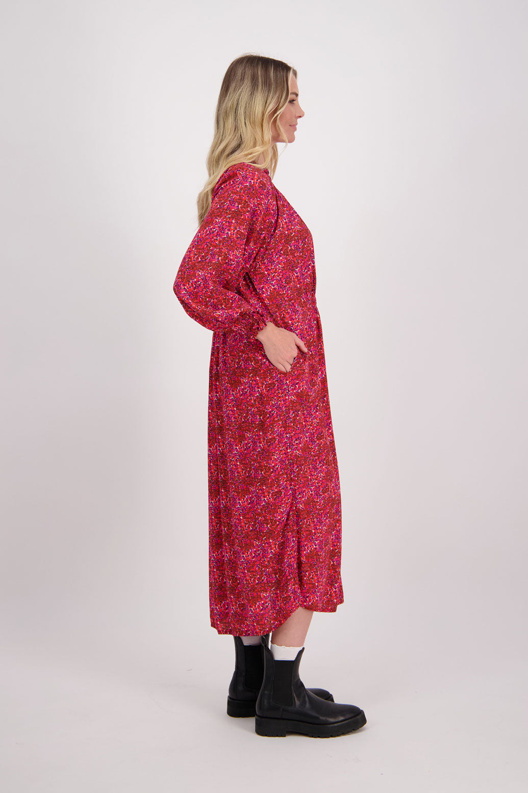 Red Floral Briarwood viscose full length dress with shirt hem detail. Shirred detail around the neck, waist and sleeves. Shirred waistline detail at front and back gives gentle shape. Henna