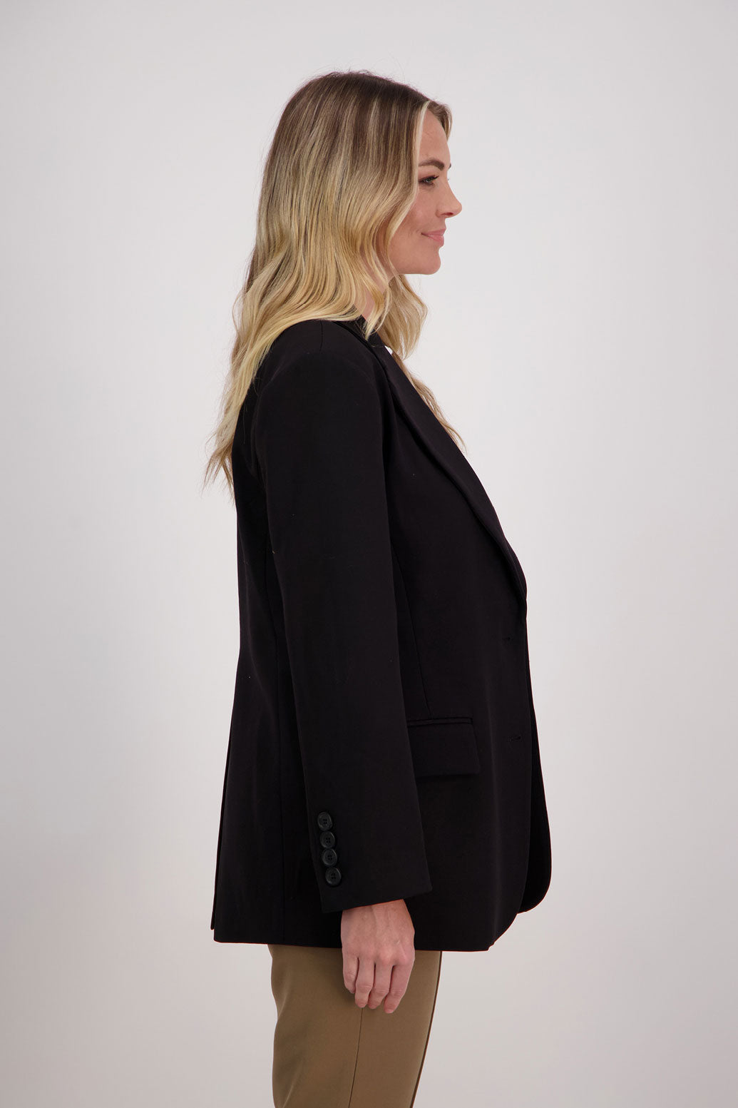 Black longline blazer with fucshia lining. Hilary