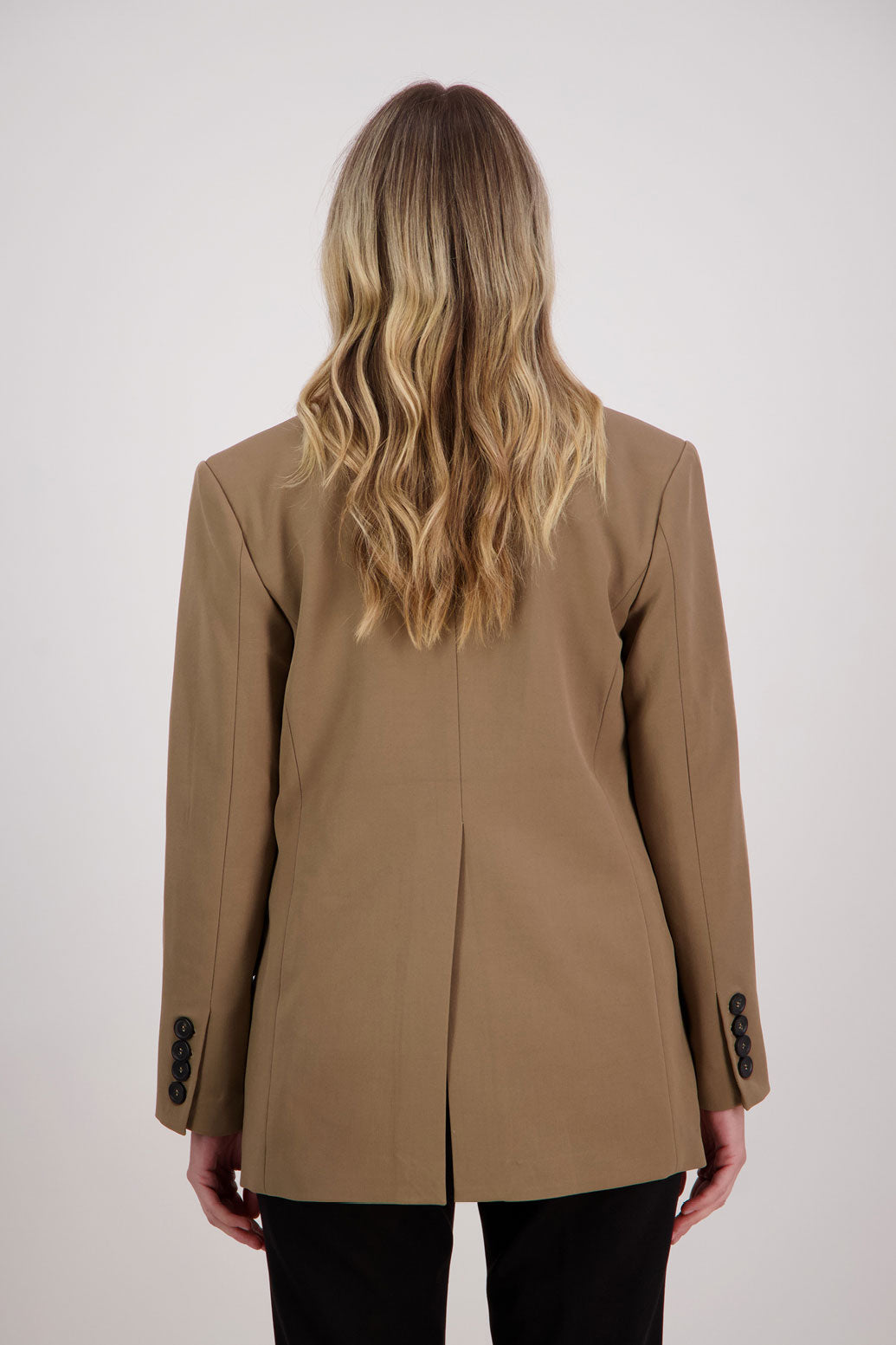 Camel longline blazer with fucshia lining. Hilary