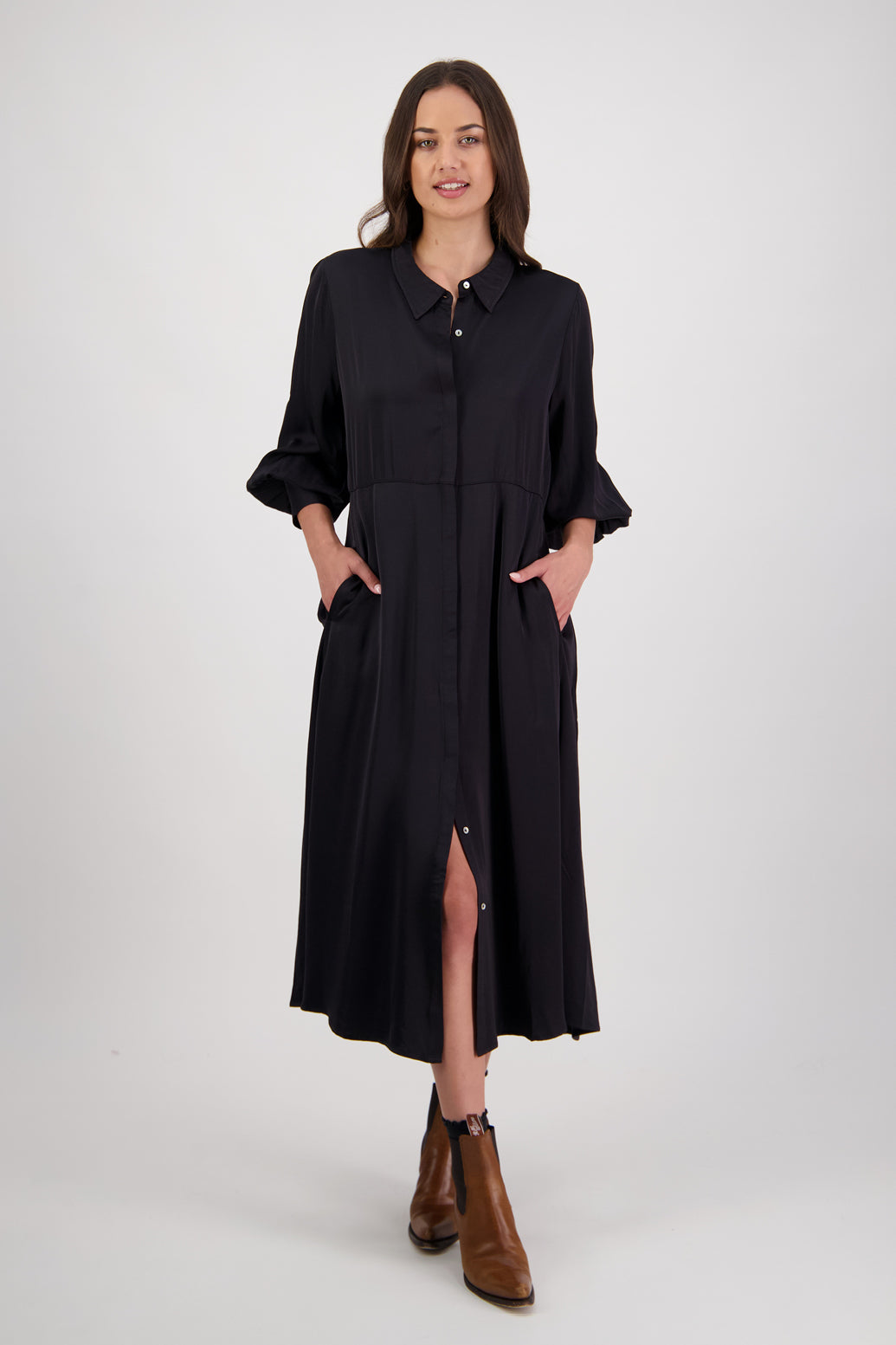 Hollie Black Shirt Dress by Briarwood NZ. 100% Viscose shirt dress with long full length sleeves, fitted through the body, A-line skirt, Hidden button down front, extended cuff with 2 button closure