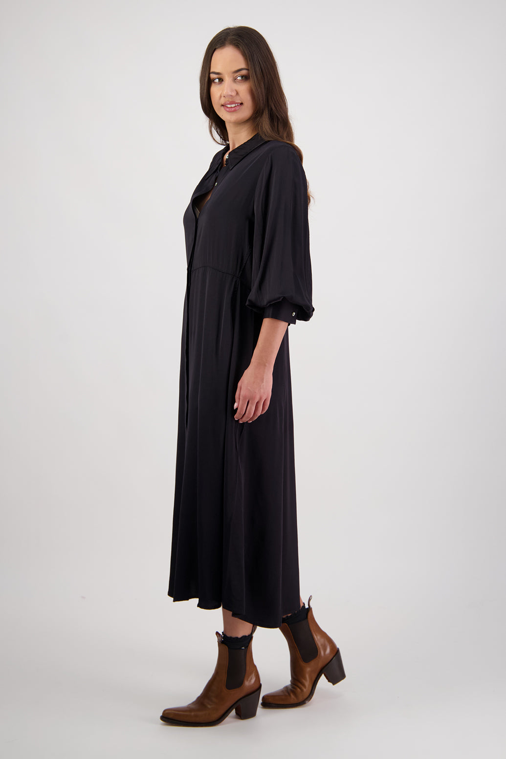 Hollie Ink Shirt Dress by Briarwood NZ. 100% Viscose shirt dress with long full length sleeves, fitted through the body, A-line skirt, Hidden button down front, extended cuff with 2 button closure
