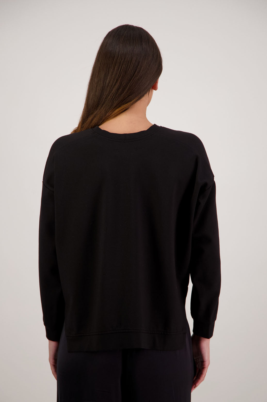 BESTSELLER. Holmes Sweatshirt in Black by Briarwood NZ. Ponte sweatshirt with full length sleeves, side split hem and contrast side stripe