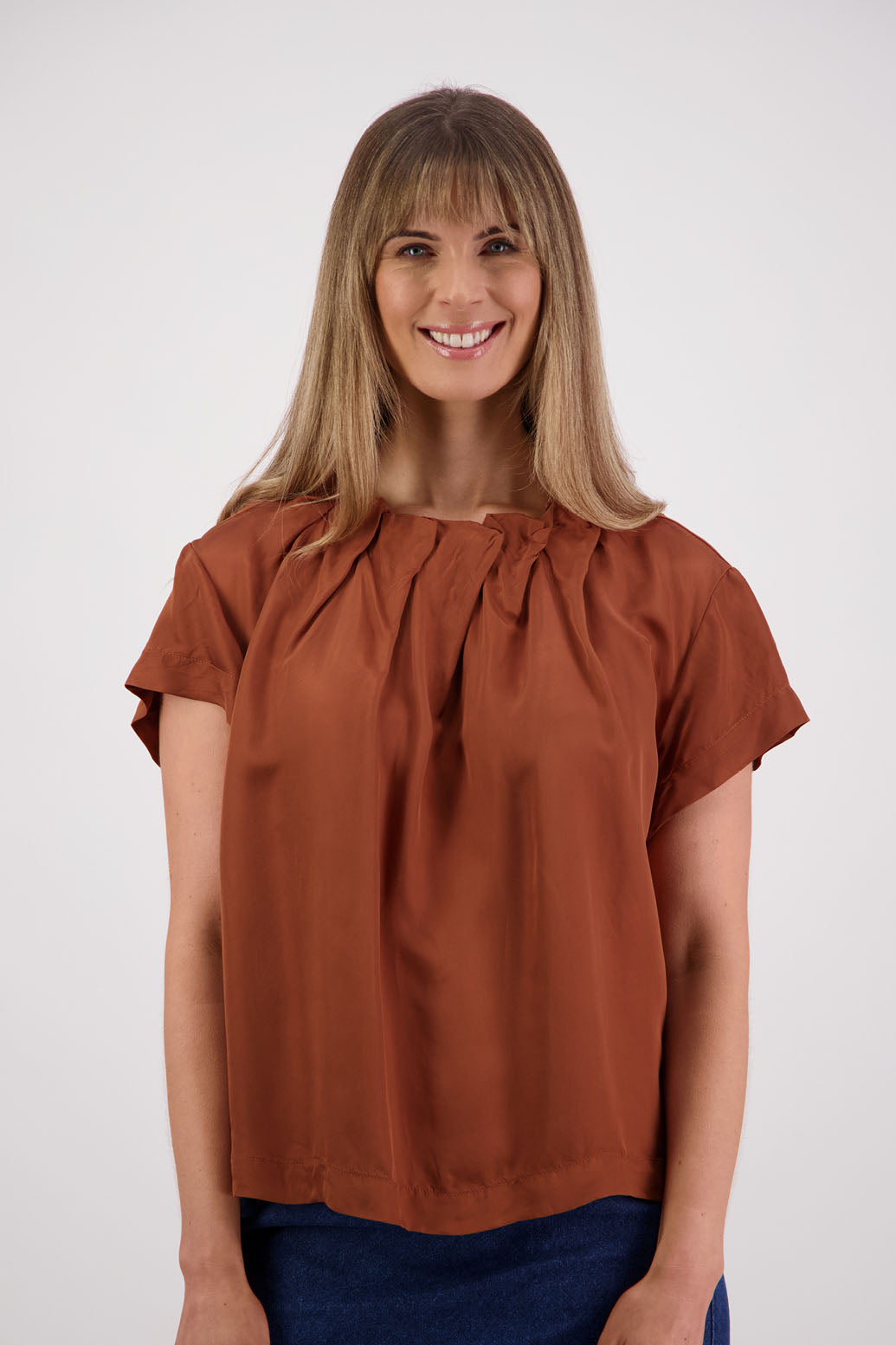 Womens Tan Top. Short sleeves with soft pleats around neck. Briarwood NZ. Jackie