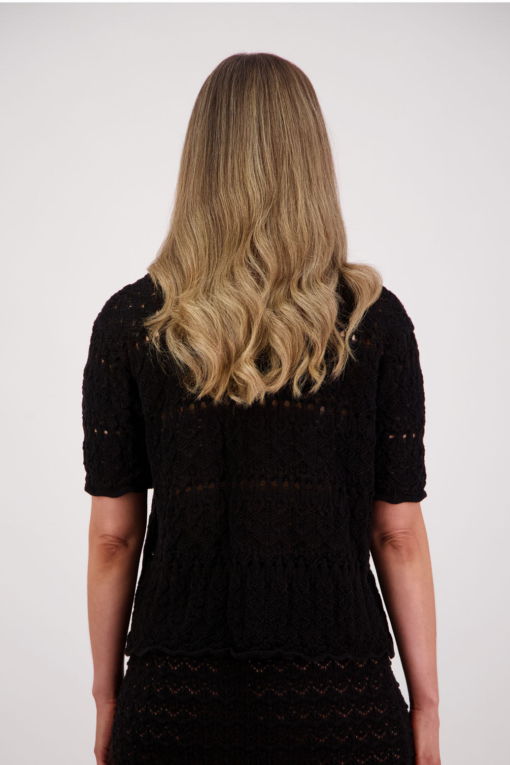 Womens knitted cotton lace short sleeve cardigan with shaped hem and scalloped edging. Briarwood NZ. Posy, Black