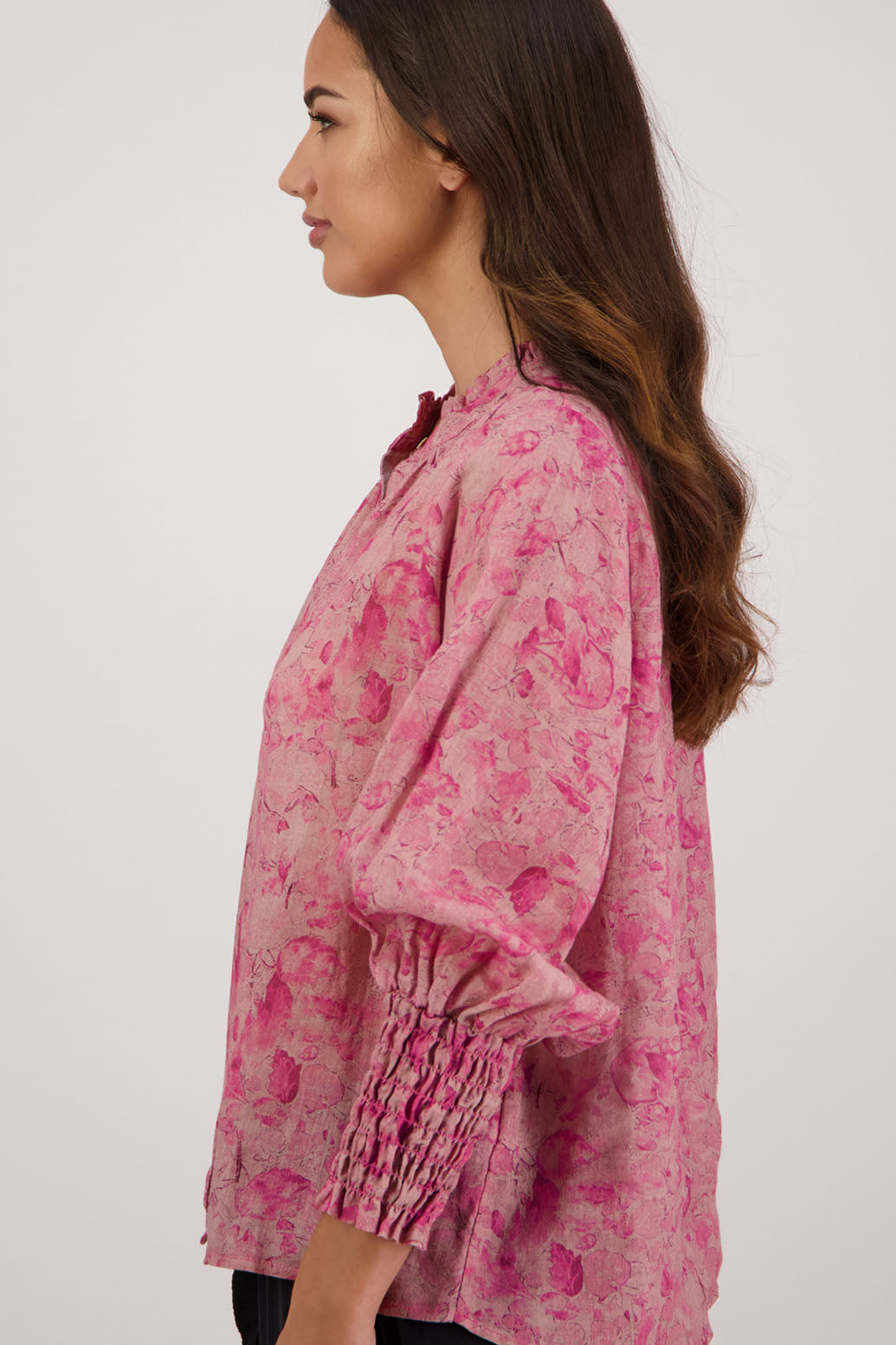 Raewyn Shirt in Pink Floral by Briarwood NZ. 100% Ramie shirt with long sleeves, ruffle neckline, shirred waist and button front.
