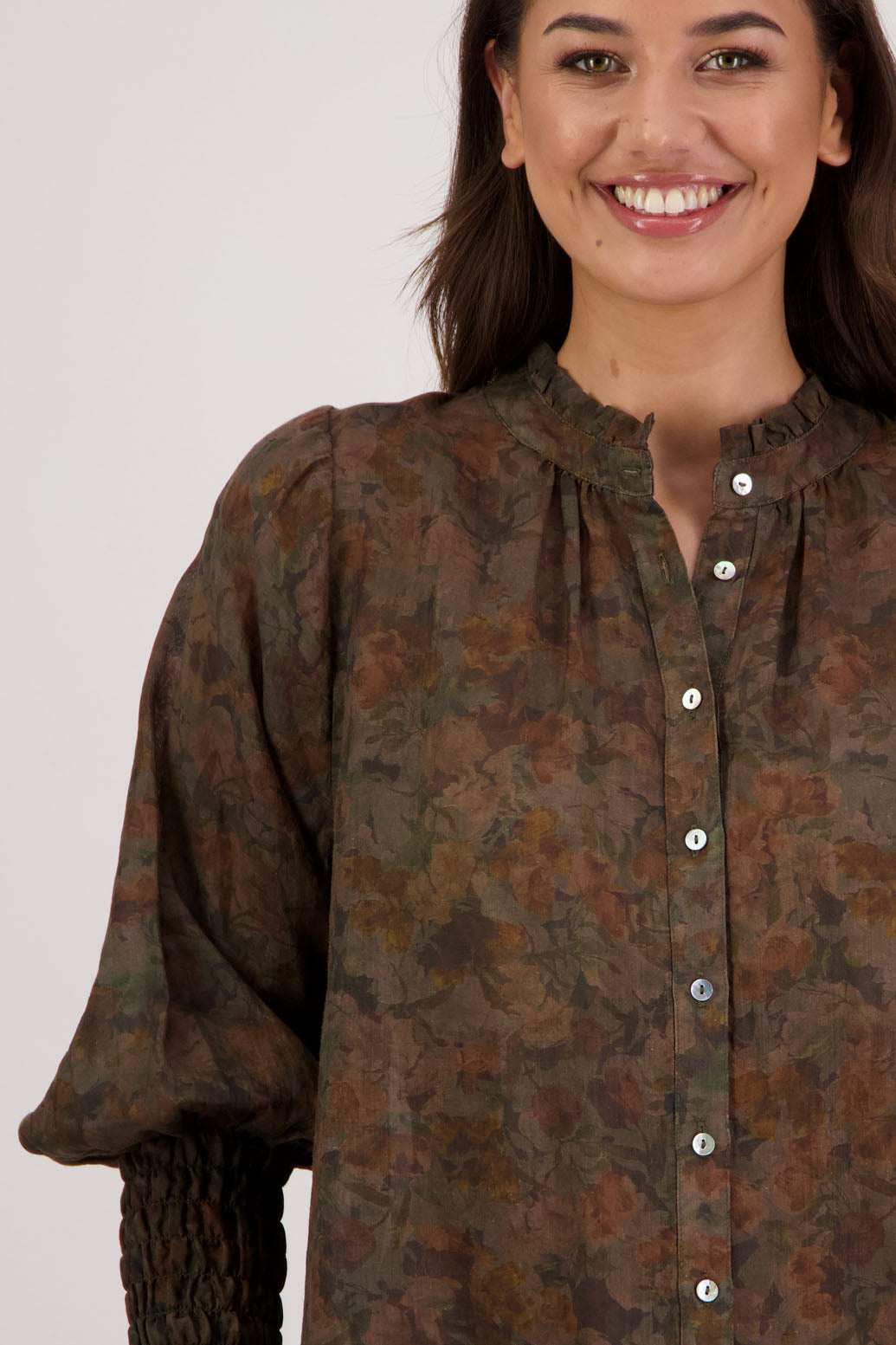 Raewyn Shirt in Vintage Floral by Briarwood NZ. Lightweight 100% Ramie shirt with long sleeves, ruffle neckline, shirred waist and button front.