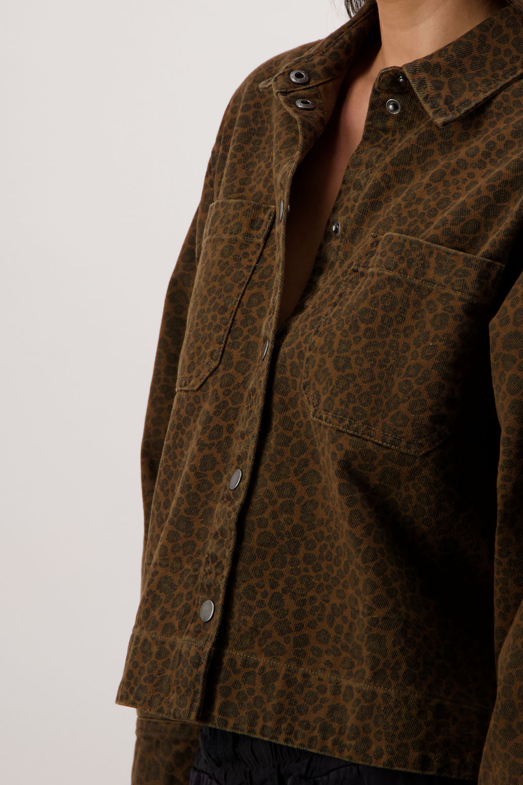 Raff Denim Jacket in Tan Animal by Briarwood NZ. 100% cotton denim jacket style, pleats in back, dome closure, front pockets, collar