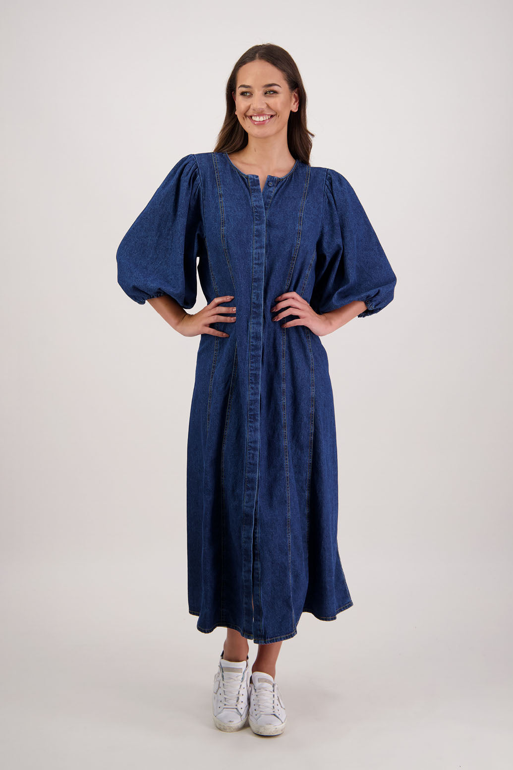Rafferty Denim Dress by Briarwood NZ. 100% cotton dress, 3/4 sleeves, button through full length with no collar, stitched shaped panels front & back