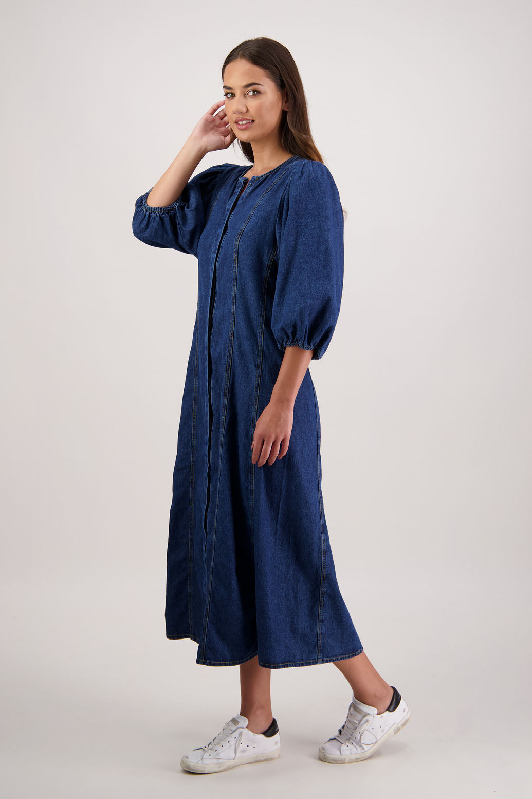 Rafferty Denim Dress by Briarwood NZ. 100% cotton dress, 3/4 sleeves, button through full length with no collar, stitched shaped panels front & back