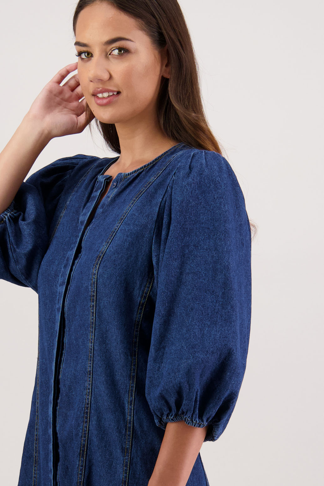 Rafferty Denim Dress by Briarwood NZ. 100% cotton dress, 3/4 sleeves, button through full length with no collar, stitched shaped panels front & back